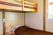 Chambre avec lit superposé du chalet Sarlat