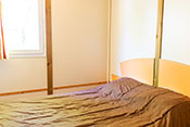 Sarlat Chalet's bedroom with double bed