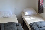 xxl mobile home's bedroom with twin bed 90cm